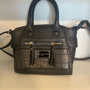 Brand new never used black Christian Laccroix bag